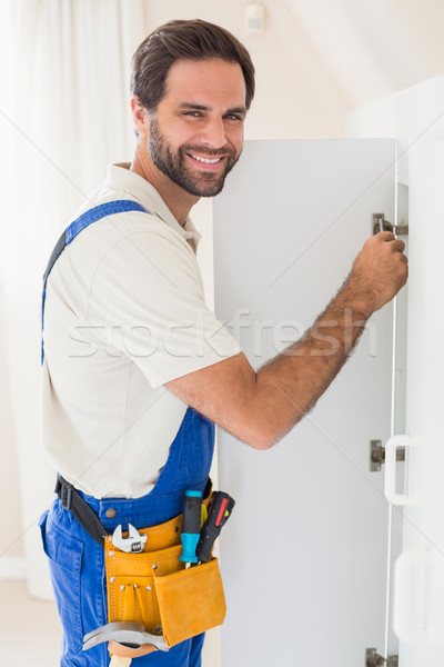 Handwerker Festsetzung Kleiderschrank Haus Mann Stock foto © wavebreak_media