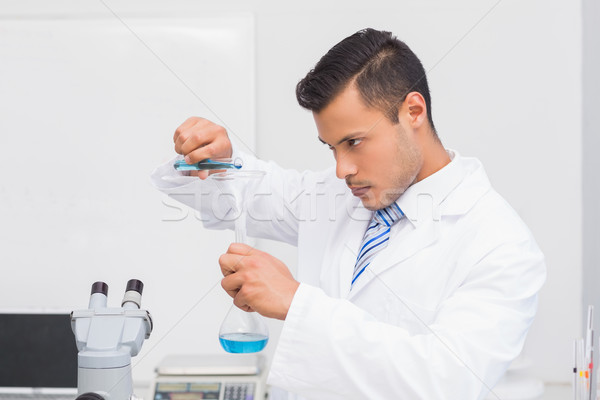 Serious scientist doing tube tests  Stock photo © wavebreak_media