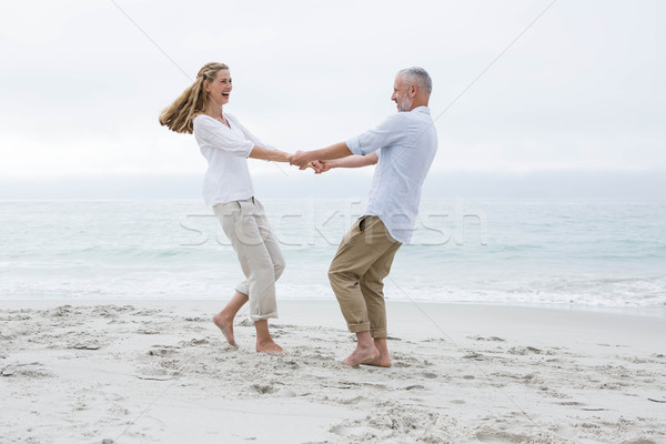 Feliz casal juntos praia oceano Foto stock © wavebreak_media