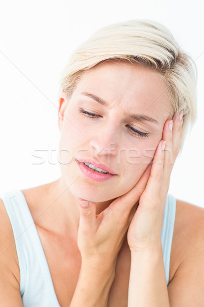 Pretty blonde with tooth pain  Stock photo © wavebreak_media
