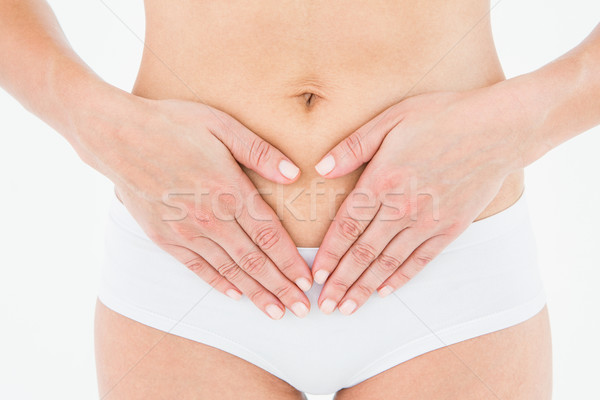 Caber mulher estômago dor branco corpo Foto stock © wavebreak_media