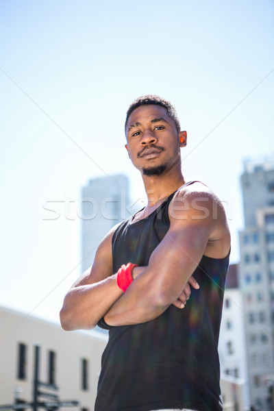 Portret przystojny sportowiec ramię szczęśliwy Zdjęcia stock © wavebreak_media