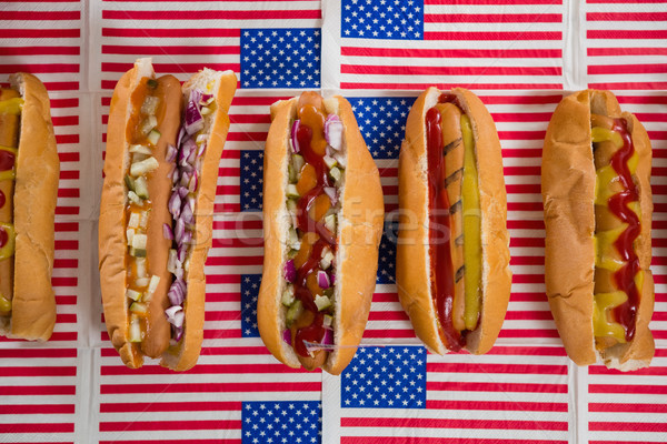 American flag and hot dogs on wooden table Stock photo © wavebreak_media