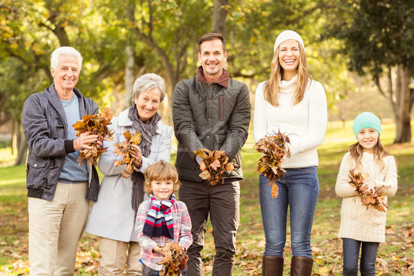 Extended family are ready to throw leaves around Stock photo © wavebreak_media