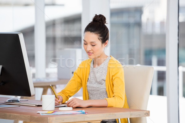 Travail fille écrit bureau travaux communication [[stock_photo]] © wavebreak_media