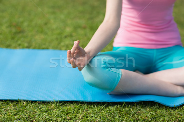 Woman practicing yoga Stock photo © wavebreak_media