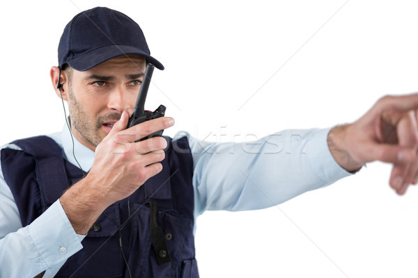 Security officer talking on walkie-talkie Stock photo © wavebreak_media