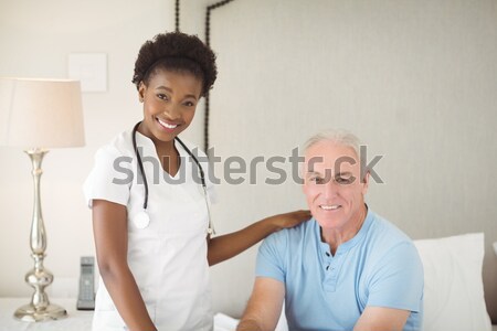 Doctor consoling a patient in hospital Stock photo © wavebreak_media