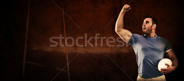 összetett kép rögbi játékos éljenez labda Stock fotó © wavebreak_media