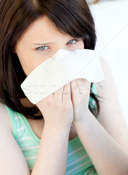 Portrait of a sick teen girl blowing Stock photo © wavebreak_media