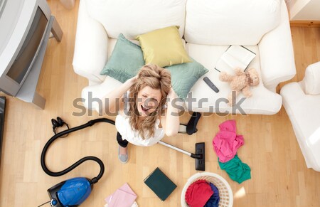 Hayal kırıklığına uğramış sarışın kadın livingroom kulaklık Stok fotoğraf © wavebreak_media