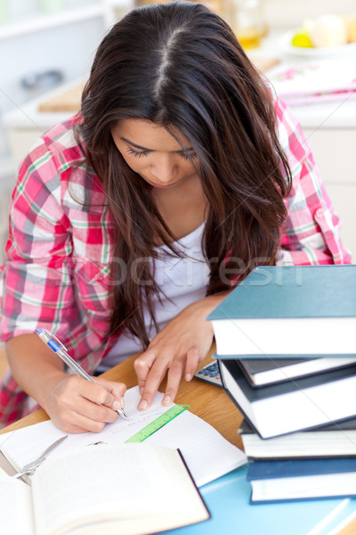 年輕女子 功課 表 書 筆 模型 商業照片 © wavebreak_media