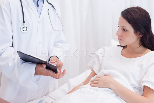 Stock photo: Female patient getting examination results explained