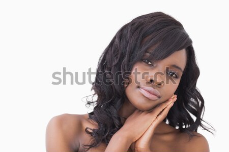 Stock photo: Pretty woman wearing red dress against white background 