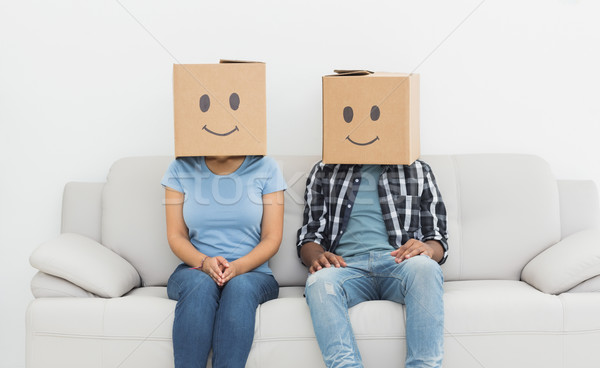 Couple with happy smiley boxes over faces Stock photo © wavebreak_media