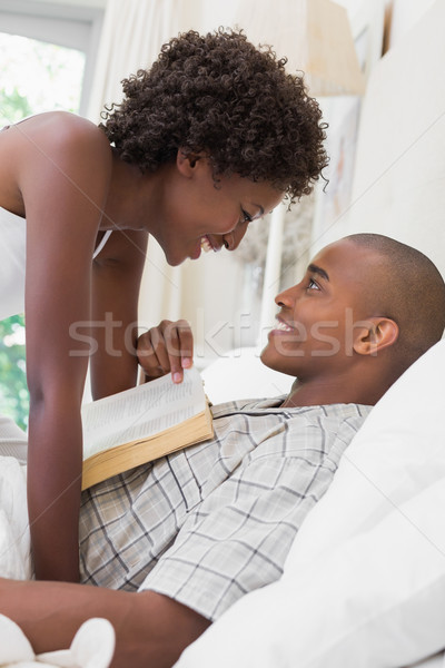 Intimate couple messing about in the morning on bed Stock photo © wavebreak_media