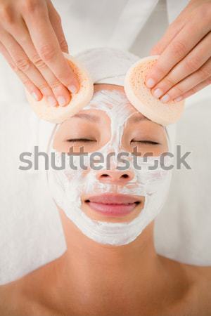 Stock photo: Attractive woman receiving treatment at spa center
