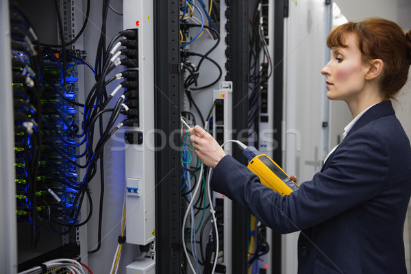 Technician using digital cable analyzer on server  Stock photo © wavebreak_media