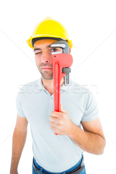 Manual trabajador mirando mono llave blanco Foto stock © wavebreak_media