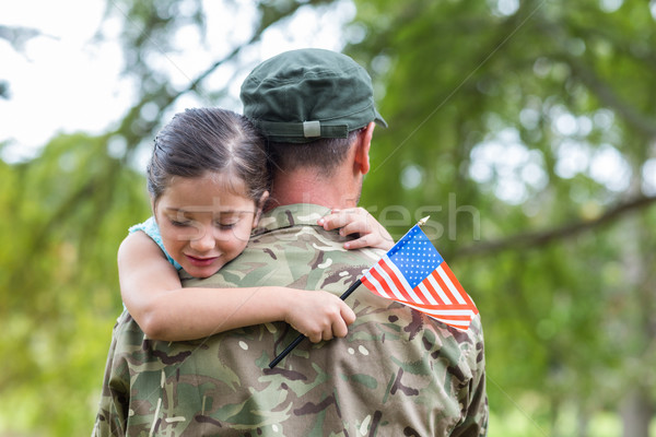 Stock photo: Soldier reunited with his daughter