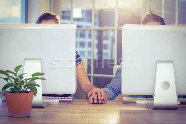 Pár kéz a kézben munka kreatív iroda számítógép Stock fotó © wavebreak_media