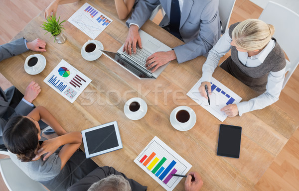 Stock photo: Business team discussing the graphs 