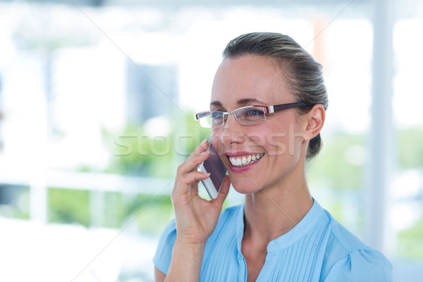 Smiling businesswoman having a phone call Stock photo © wavebreak_media