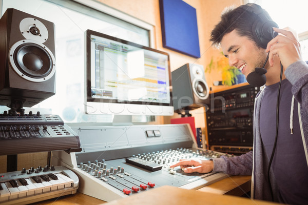 Portrait of an university student mixing audio Stock photo © wavebreak_media
