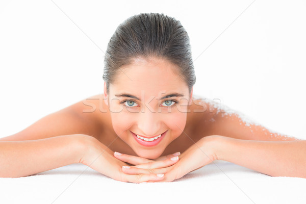 Stock photo: Portrait of a beautiful brunette enjoying a salt scrub treatment