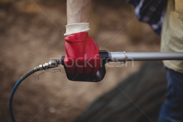 Mid section of man holding rake Stock photo © wavebreak_media