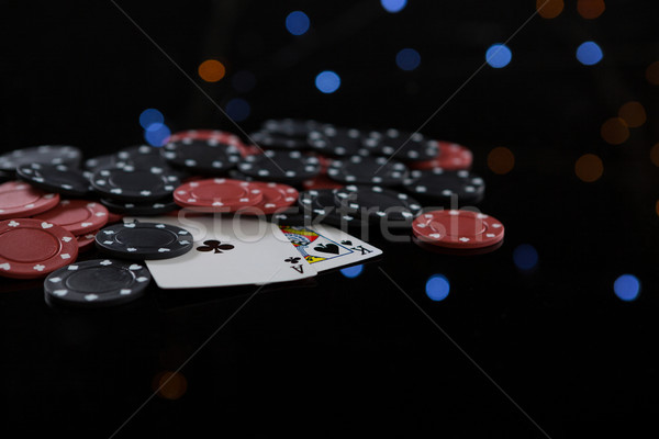 Primo piano carte poker chips casino nero successo Foto d'archivio © wavebreak_media