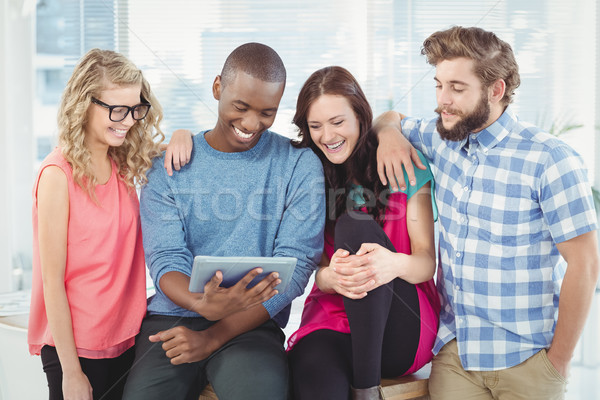 Happy Business professionals using tablet  Stock photo © wavebreak_media