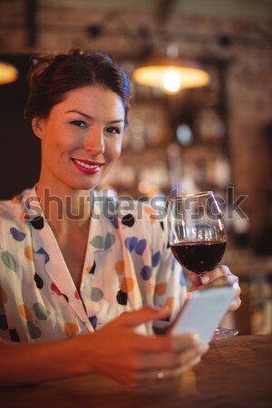 Woman holding wine glass Stock photo © wavebreak_media
