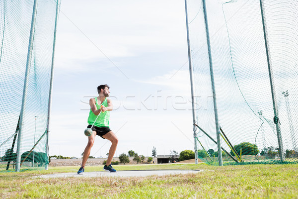 Athlete performing a hammer throw Stock photo © wavebreak_media