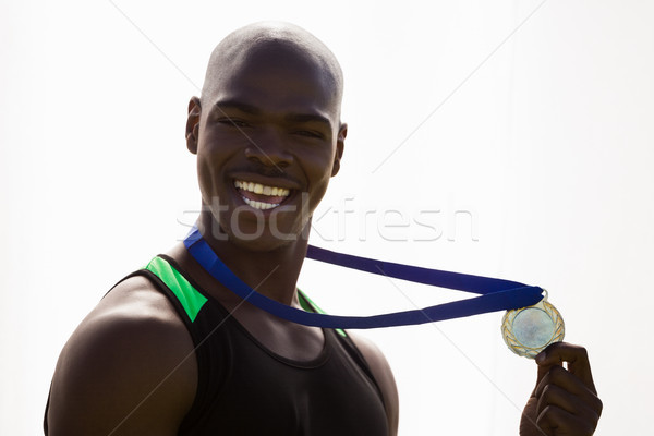 Stockfoto: Atleet · goud · rond · nek · poseren