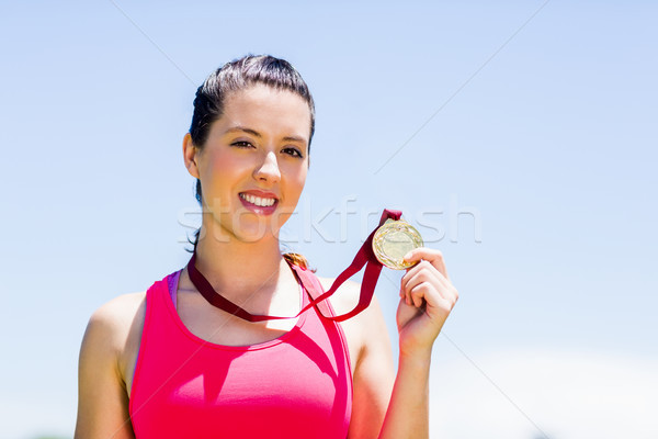 Portrait Homme athlète médaille d'or heureux [[stock_photo]] © wavebreak_media