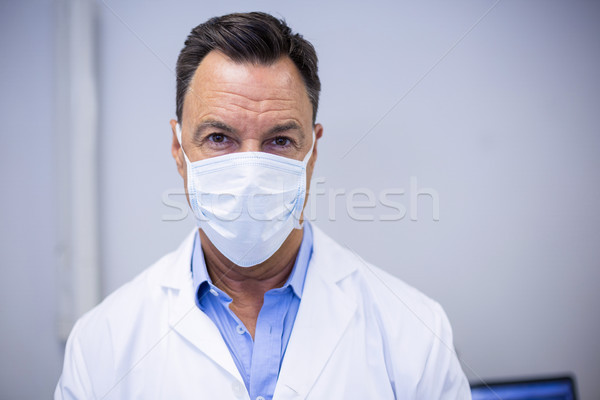 Fogorvos visel műtősmaszk fogászati klinika férfi Stock fotó © wavebreak_media