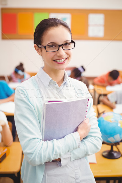 Tanár mosolyog kamera osztályterem nő lány Stock fotó © wavebreak_media
