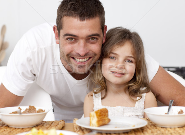 Portrait of father and daughter having breakfast Stock photo © wavebreak_media