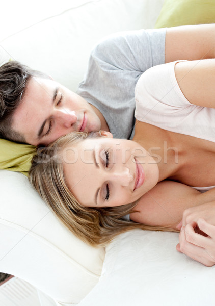 Sleeping lovers having fun together on a sofa Stock photo © wavebreak_media