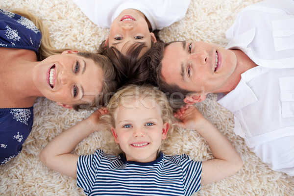 Mosolyog fiatal család padló együtt mosoly Stock fotó © wavebreak_media