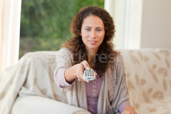 Stockfoto: Vrouw · afstandsbediening · home · gelukkig · ontspannen · portret