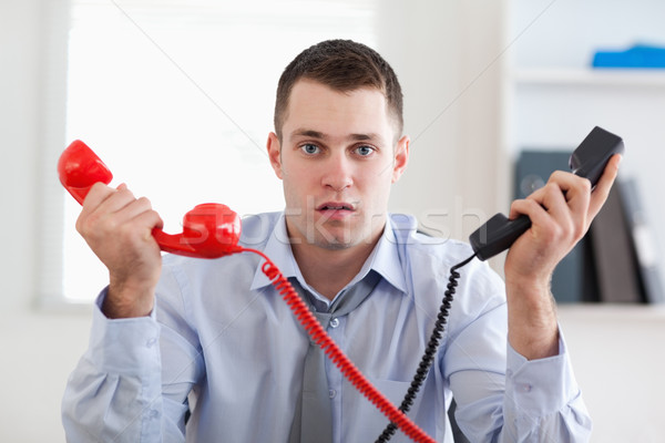 Businessman overextended with the phone Stock photo © wavebreak_media