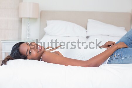 Mujer hasta dormitorio salud tiempo cama Foto stock © wavebreak_media