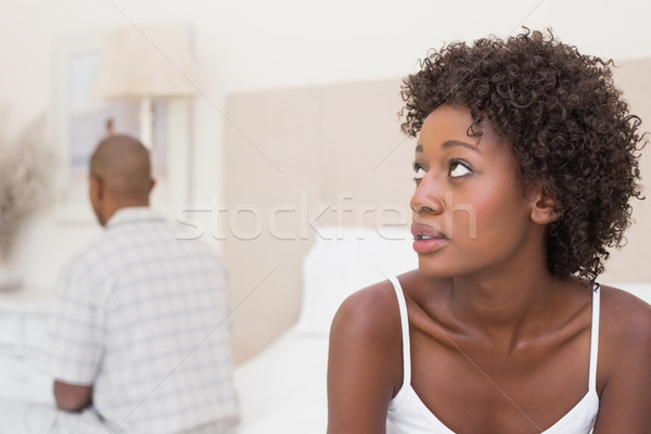 Unhappy couple not speaking to each other on bed Stock photo © wavebreak_media