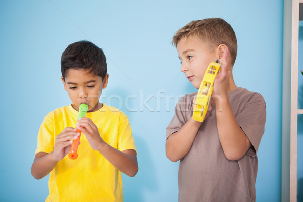 Aranyos kicsi fiúk játszik hangszerek osztályterem Stock fotó © wavebreak_media