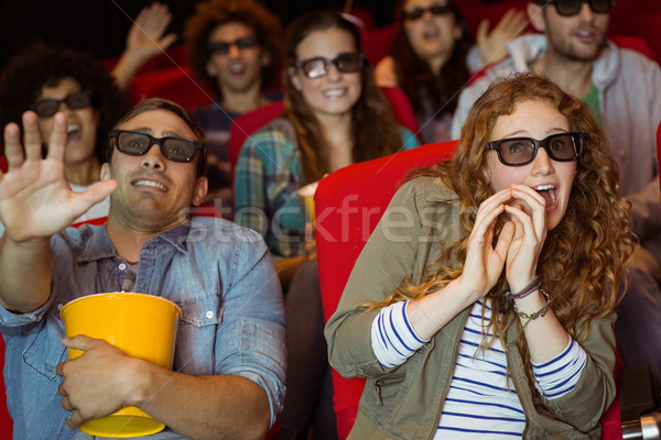 Young friends watching a 3d film Stock photo © wavebreak_media