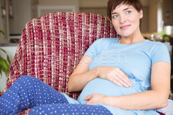 Hamile kadın rahatlatıcı kanepe ev oturma odası ev Stok fotoğraf © wavebreak_media