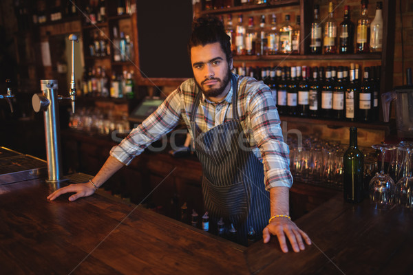 Portret chelner în picioare bar hotel sticlă Imagine de stoc © wavebreak_media
