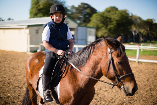 Ragazzo equitazione cavallo ranch felice Foto d'archivio © wavebreak_media